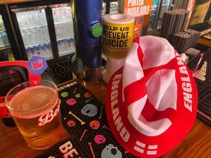 International Football Prints: A view of the bar at the Station Master Sports pub in Marylebone
