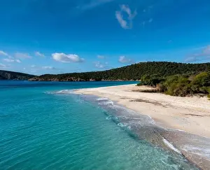 View of the beautiful wihtie sand beach and turquoise waters at Turredda Beach in Sardinia
