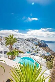 Images Dated 17th May 2019: View of caldera and swimming pool in foreground, typical white architecture village on Santorini