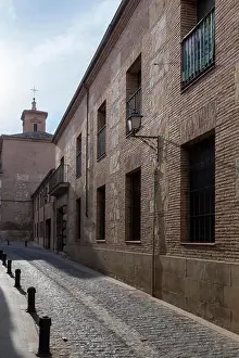 Balcony Prints: View of a cobbled street in the center of the city of Guadalajara in Spain