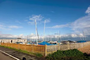 Wooden Fence Prints: View of the Downs Sailing Club, The Strand, Walmer Beach, Walmer, Deal, Kent