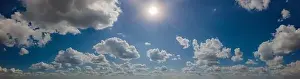 New Day Prints: View from drone, panorama blue sky and white clouds, sun at sunset