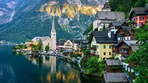 Salzburg Prints: View of famous Hallstatt mountain village in the Austrian Alps at beautiful light in summer