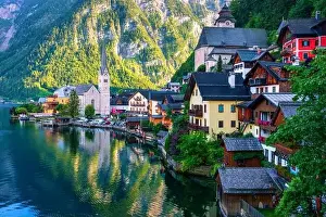 Salzburg Prints: View of famous Hallstatt mountain village in the Austrian Alps at beautiful light in summer