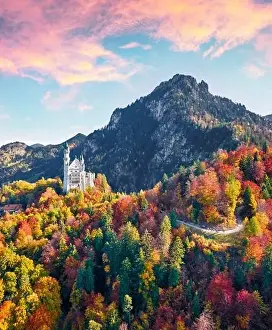 View from flying drone. Amazing autumn scene of Neuschwanstein Castle