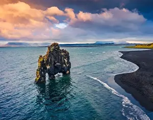 View from flying drone. Beautifulsunset with huge basalt stack - Hvitserkur on background
