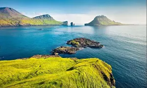Faroe Island Prints: View from flying drone. Breathtaking summer scene of Faroe Islands and Tindholmur cliffs on background