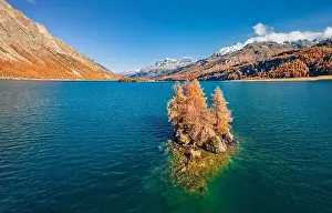 View from flying drone. Bright morning view of Sils Lake (Silsersee)