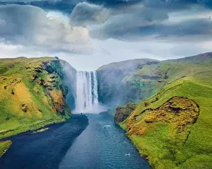 Instagram Prints: View from flying drone. Dramatic midnight sun view of Skogafoss Waterfall