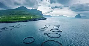 Vagar Prints: View from flying drone. Dramatic summer scene of Trollkonufingur cliffs on Vagar island