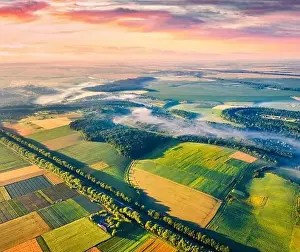 View from flying drone. Gorgeous morning scene of Ukrainian countryside with field of wheat