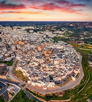 View from flying drone. Magnificent summser sunrise in Ostuni town