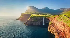 Gasadalur Prints: View from flying drone. Majestic morning scene of Mulafossur Waterfall