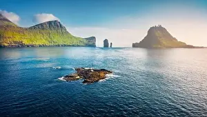 Vagar Prints: View from flying drone. Misty summer scene of Faroe Islands and Tindholmur cliffs on background