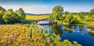 Seret Prints: View from flying drone. Panoramic morning view of bridge over Seret river