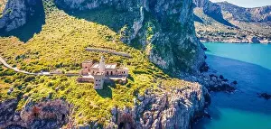 Scenic Road Prints: View from flying drone. Panoramic morning view of Zafferano cape with lighthouse