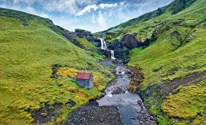 View from flying drone. Splendid morning view of nameless waterfall on Rauda river