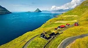 Faroe Island Prints: View from flying drone. Sunny summer view of Velbastadur village with typical turf-top houses