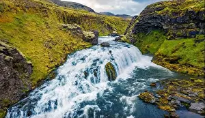 View from flying drone of waterfall on Skoga river