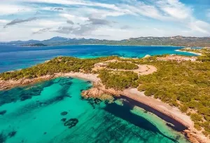 Capriccioli Prints: View from flying drone. Wonderful morning scene of popular touris deastination - Capriccioli beach