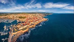 View from flying drone. Wonderful summer cityscape of Alghero port
