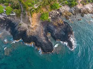 Rocky Beach Prints: View of Ganh Da Dia or Da Dia Reef is a seashore area of uniformly interlocking basalt rock columns located along