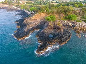 View of Ganh Da Dia or Da Dia Reef is a seashore area of uniformly interlocking basalt rock columns located along
