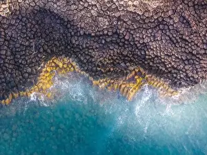 Rocky Beach Prints: View of Ganh Da Dia or Da Dia Reef is a seashore area of uniformly interlocking basalt rock columns located along