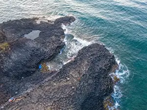 Rocky Beach Prints: View of Ganh Da Dia or Da Dia Reef is a seashore area of uniformly interlocking basalt rock columns located along