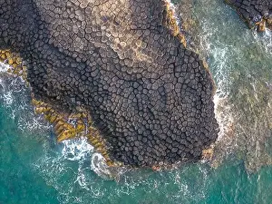Rocky Beach Prints: View of Ganh Da Dia or Da Dia Reef is a seashore area of uniformly interlocking basalt rock columns located along