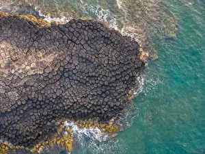 Rocky Beach Prints: View of Ganh Da Dia or Da Dia Reef is a seashore area of uniformly interlocking basalt rock columns located along