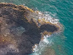 Rocky Beach Prints: View of Ganh Da Dia or Da Dia Reef is a seashore area of uniformly interlocking basalt rock columns located along