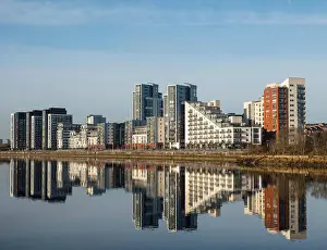 Dwellings Prints: View of Glasgow Harbour modern property development with many high-rise modern riverside apartment buildings in Glasgow