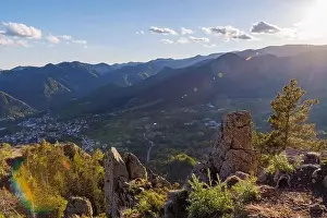Mountain Town Prints: View from high rock to old village town of Smolyan with green meadows for cattle walking and ancient houses