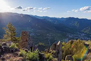 Mountain Town Prints: View from high rock to old village town of Smolyan with green meadows for cattle walking and ancient houses