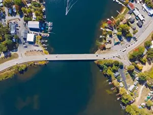 Island Lake Prints: Top view of Lake Winnisquam and US Route 3 bridge between town of Belmont and Sanbornton in New Hampshire NH
