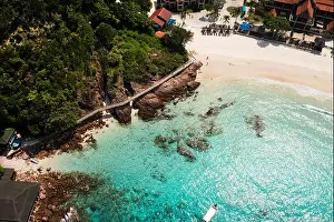 Long Beach Prints: Top view of Long beach with clear turquoise waters and tourists on Redang Island. Malaysia