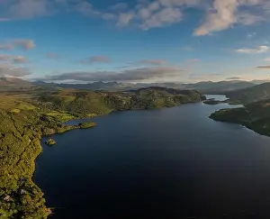 A view of Lough Caragh lake in the Glencar Valley of Kerry County in warm eveing light