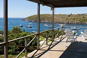 Porch Prints: A view of Monhegan Island's harbor from the porch of a small hotel there