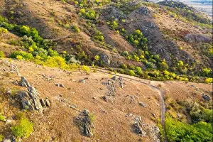 Top view over mountain trail landscape. Aerial drone view