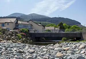 A view of the Mountains of Mourne from the stony beach at the mouth of the Glen River at Newcastle County Down in