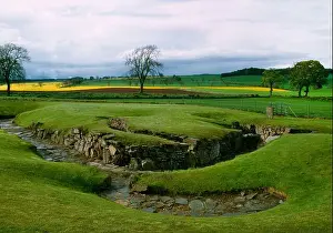 Arable Prints: View N of Carlungie Iron Age earth house (souterrain)