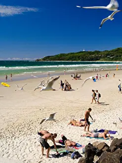 Caucasian Appearance Prints: View of people enjoying the morning at Byron Bay Beach, Byron Bay, NSW, Australia