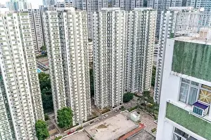 The view of residential neighborhood and skyscrapers from rooftop in Hong Kong