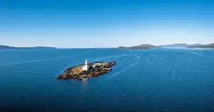 Cork County Prints: View of the Roancarrigmore Island Lighthouse in Bantry Bay in County Cork