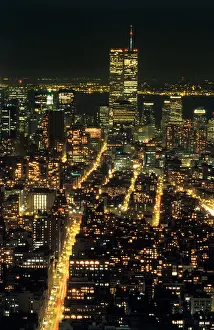 View south, at night, from the Empire State Building to the twin towers of the world trade centre