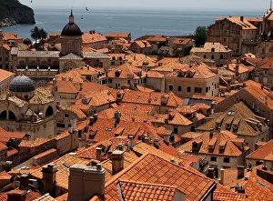 Dubrovnik Prints: View of terracotta rooftops of walled Old Town Dubrovnik Croatia showing St Blaise Church Adriatic sea