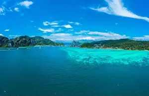 Top view of tropical island with limestone rocks and blue clear water