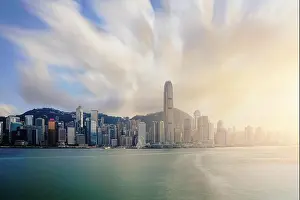 Architecture View Prints: View of Victoria Harbour with Hong Kong skyscraper office buildings at sunset time in Hong Kong