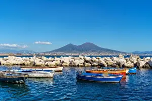 City Day Prints: View of Volcano Vesuvius view from seafront with colorful boats in the foreground